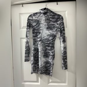 Black and white sheer dress with dragon print